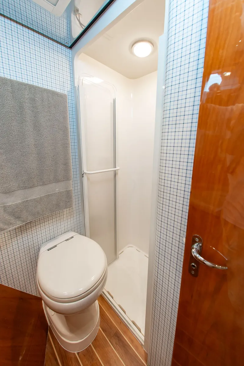 Slide: The Image of Bathroom in a 2008 Bertram 510 Convertible yacht. - 29