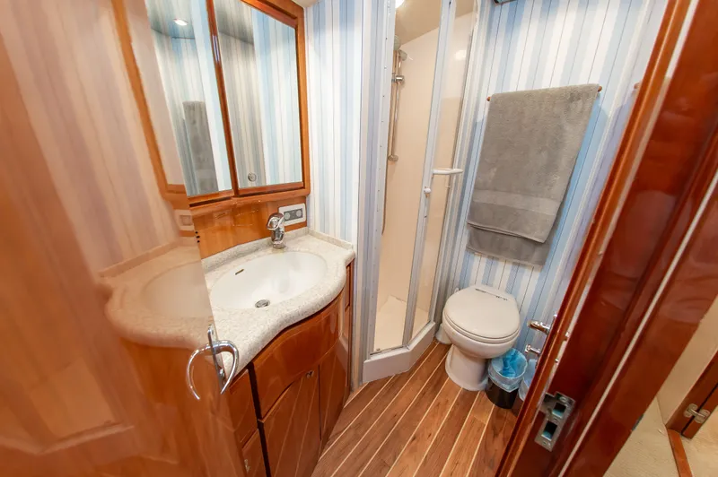 Slide: The Image of Luxurious bathroom on a 2008 Bertram 510 Convertible yacht. - 32