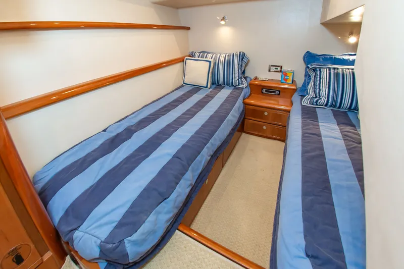 Slide: The Image of Interior of 2008 Bertram 510 Convertible yacht with twin beds. - 33