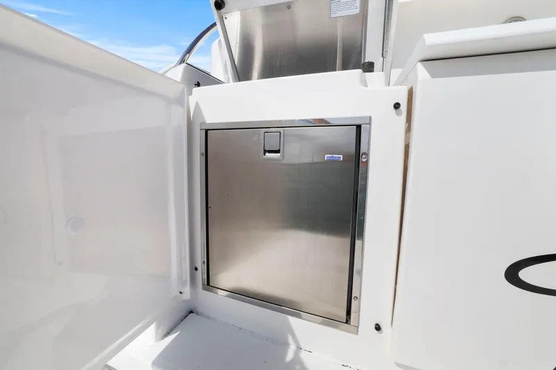 Slide: The Image of Stainless steel compartment on 2023 Tiara Yachts C49 Coupe, exterior view. - 18