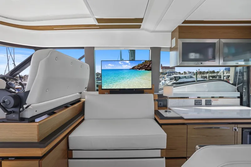 Slide: The Image of Luxurious interior of 2023 Tiara Yachts C49 Coupe with modern seating and scenic view. - 44
