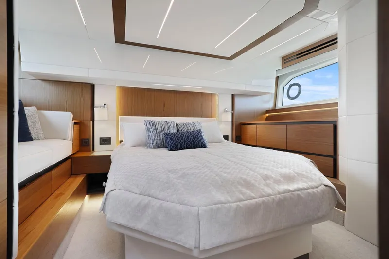 Slide: The Image of Luxurious bedroom interior of 2023 Tiara Yachts C49 Coupe with modern design and elegant furnishings. - 51