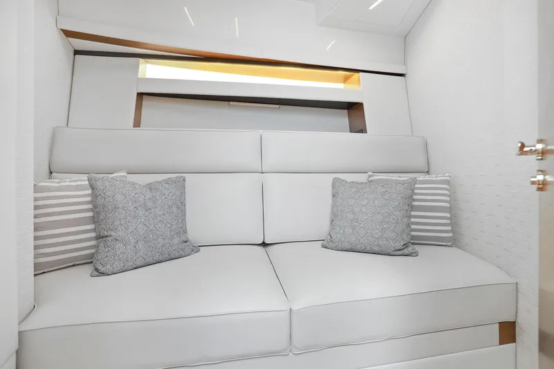 Slide: The Image of Luxurious interior of 2023 Tiara Yachts C49 Coupe with elegant cushions and modern design. - 74