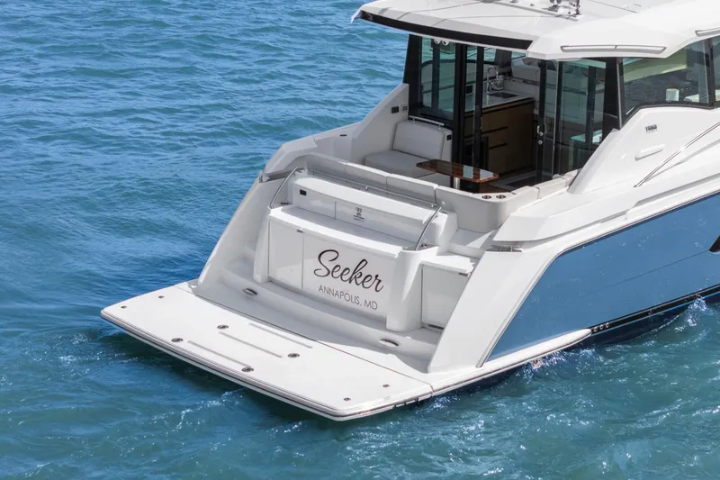 Slide: The Image of 2023 Tiara Yachts C49 Coupe on water, rear view, Annapolis, MD. - 9