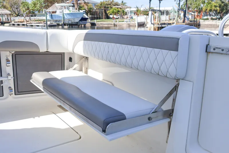 Slide: The Image of 2022 World Cat 280 CC-X boat with foldable seating and sleek design. - 14