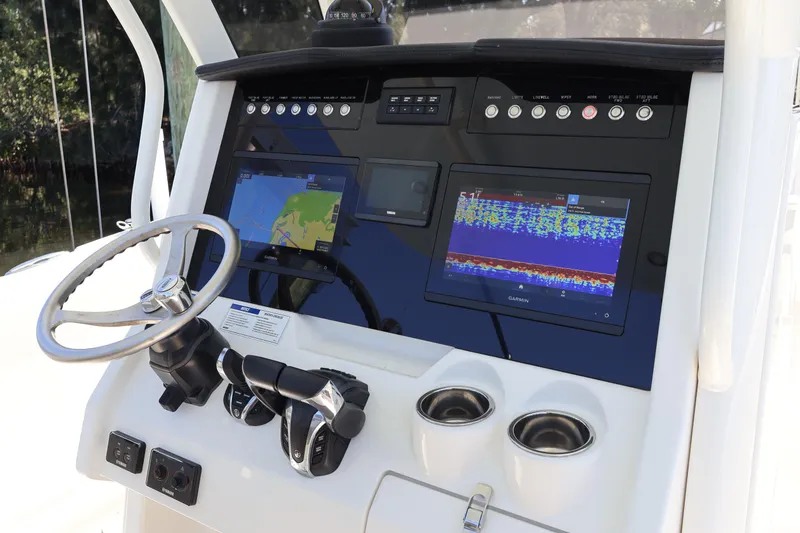 Slide: The Image of 2022 World Cat 280 CC-X dashboard with Garmin navigation and control systems. - 28