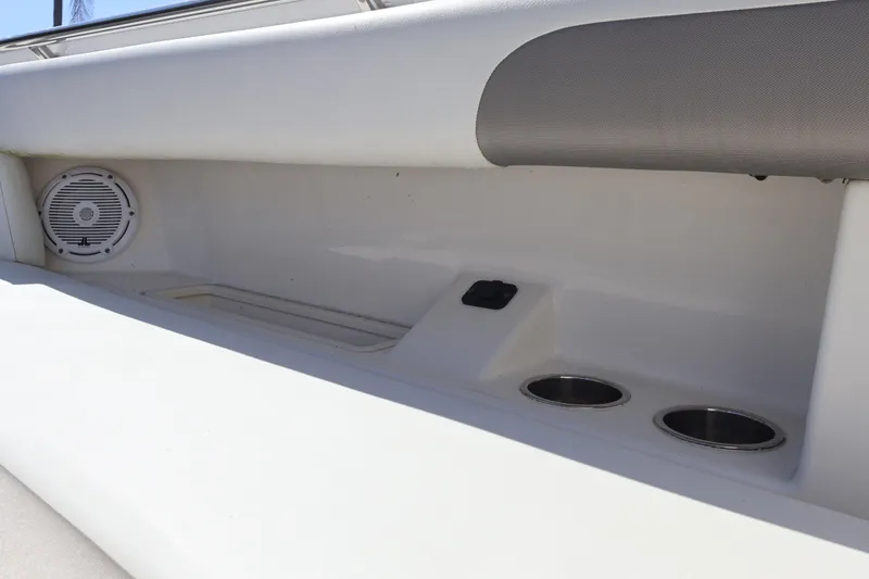 Slide: The Image of 2022 World Cat 280 CC-X boat interior with speaker and cup holders. - 41