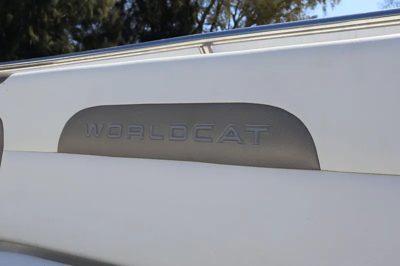 Slide: The Image of 2022 World Cat 280 CC-X boat logo on white interior panel. - 43