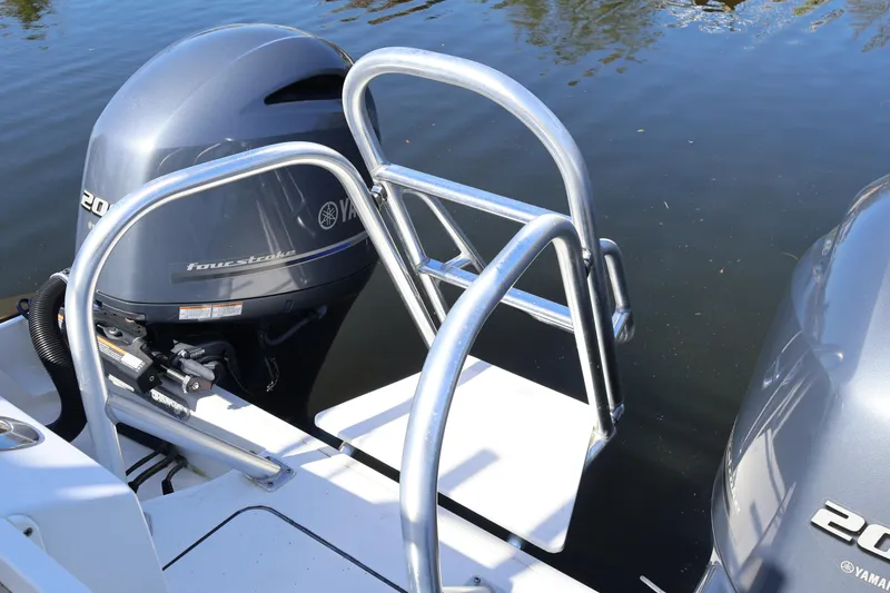 Slide: The Image of Boat with Yamaha outboard engines and swim ladder, World Cat 280 CC-X, 2022 model. - 9
