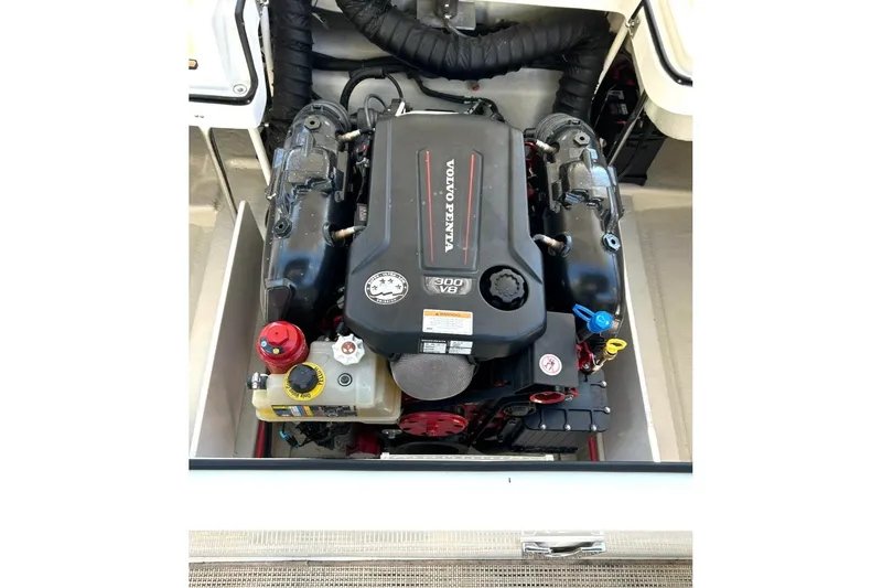 Slide: The Image of Engine compartment of a 2017 Cobalt R5 boat featuring a Volvo Penta V8 engine. - 12