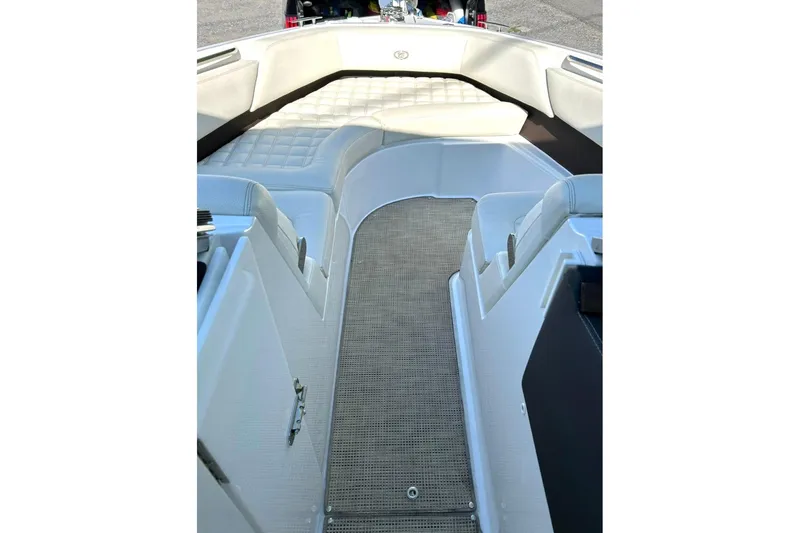 Slide: The Image of Interior view of a 2017 Cobalt R5 boat with white seating and carpeted flooring. - 9