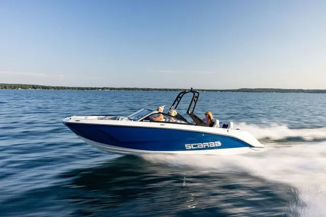 Slide: The Image of Scarab Jet Boats 235 SE 2027 cruising on water. - 1