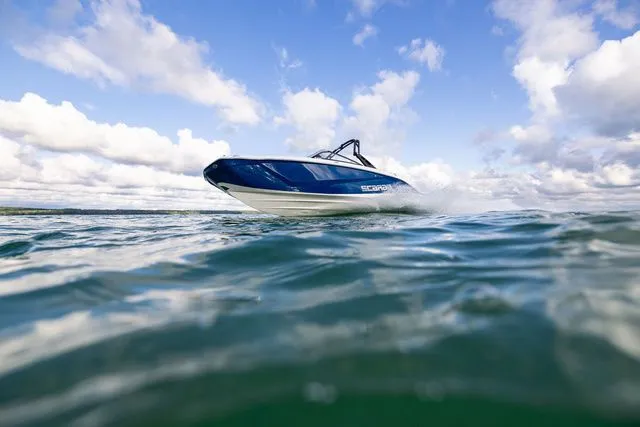Slide: The Image of Scarab Jet Boats 235 SE 2027 on the water. - 27