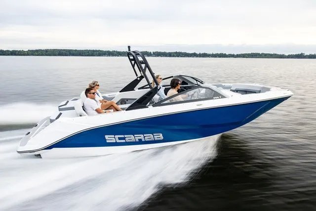 Slide: The Image of Scarab Jet Boats 235 SE 2027 on the water. - 5