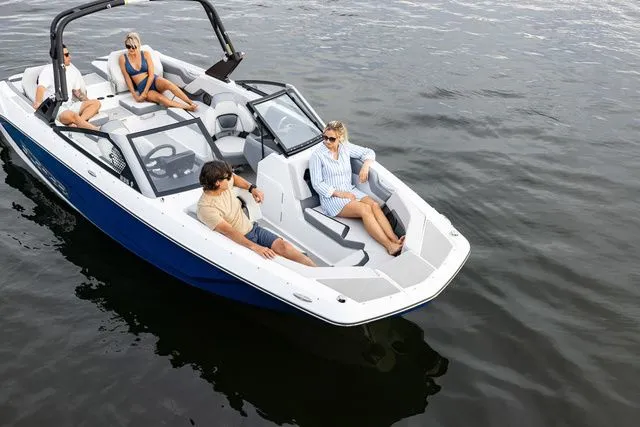 Slide: The Image of Scarab Jet Boats 235 SE 2027 on water with passengers. - 6