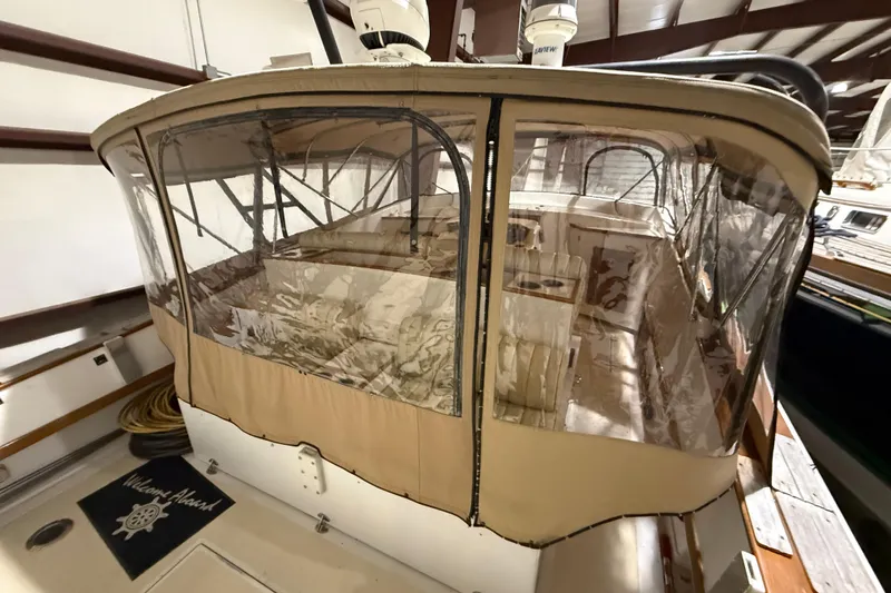 Slide: The Image of 1979 Magnum 38 Sport boat with enclosed cockpit, stored indoors. - 20