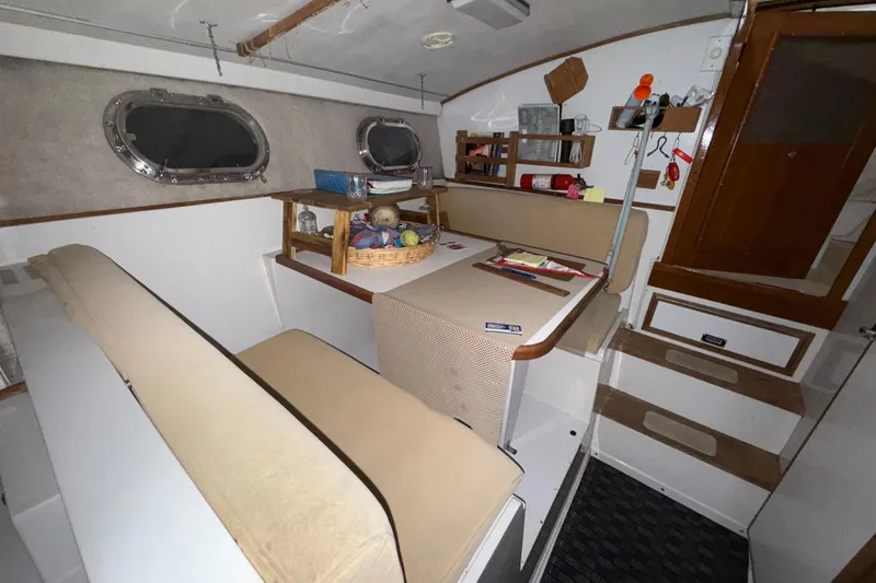 Slide: The Image of Interior of a 1979 Magnum 38 Sport boat with seating and storage. - 45