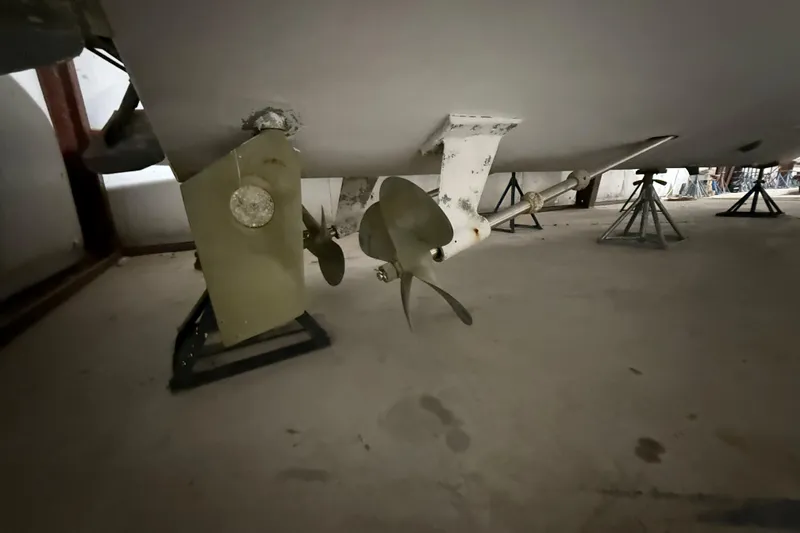 Slide: The Image of Underwater view of a 1979 Magnum 38 Sport boat propeller and rudder. - 51