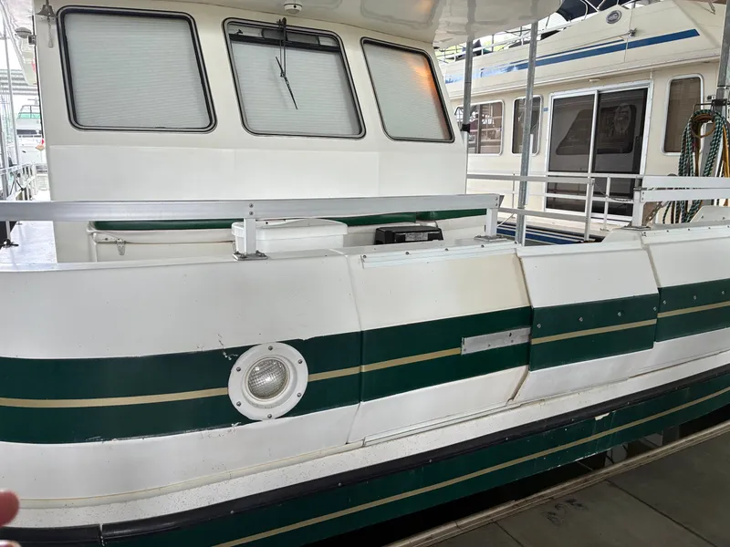 The Image of 1993 Gibson 50 houseboat docked in marina. - 0