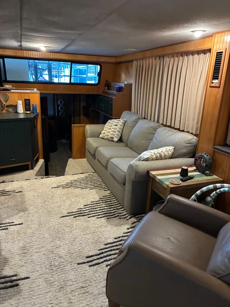 Slide: The Image of Interior of a 1993 Gibson 50 yacht with cozy sofa. - 11