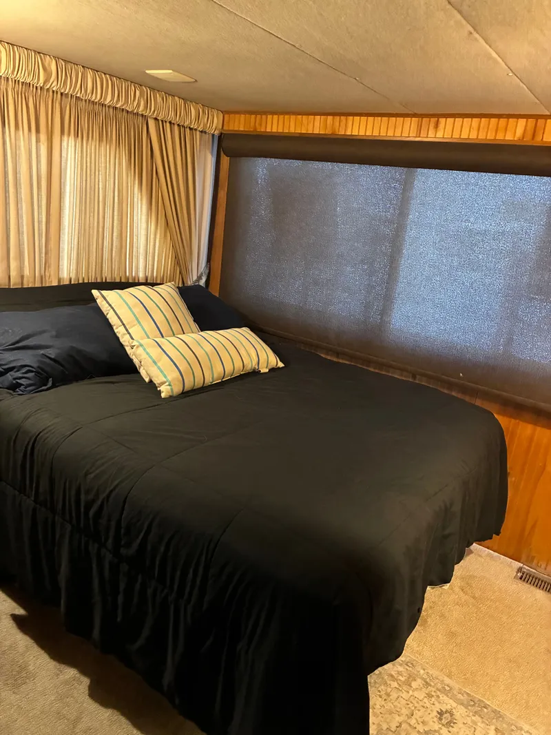 Slide: The Image of Bedroom in a 1993 Gibson 50 boat. - 13