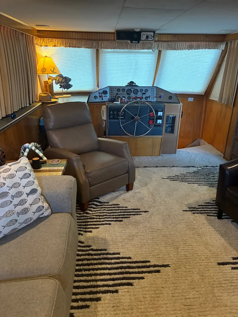 Slide: The Image of Interior of a 1993 Gibson 50 yacht with helm and cozy furnishings. - 19