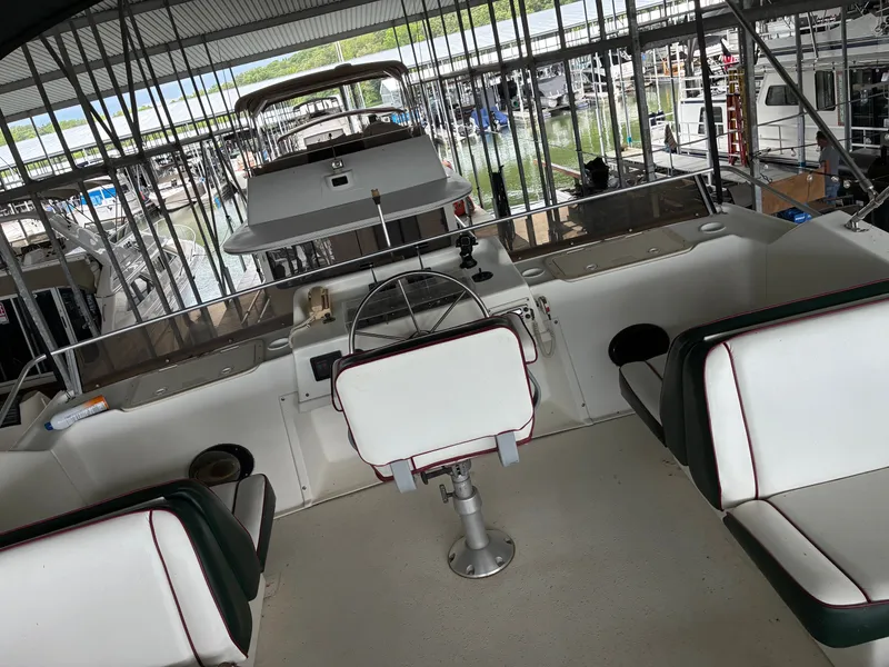 Slide: The Image of Interior view of a 1993 Gibson 50 boat in the marina. - 6