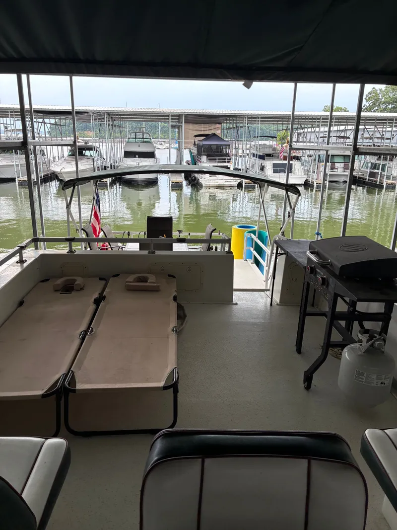 Slide: The Image of Interior of a 1993 Gibson 50 boat docked at marina. - 7