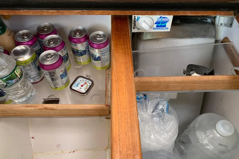 Slide: The Image of Refrigerator interior with drinks and ice, Caliber Cutter Rig 1994. - 31