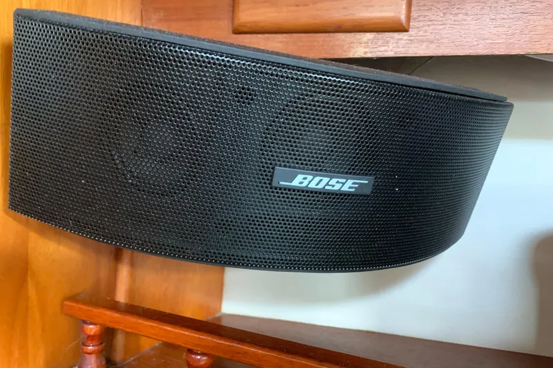 Slide: The Image of Bose speaker mounted on wooden interior of 1994 Caliber Cutter Rig yacht. - 55