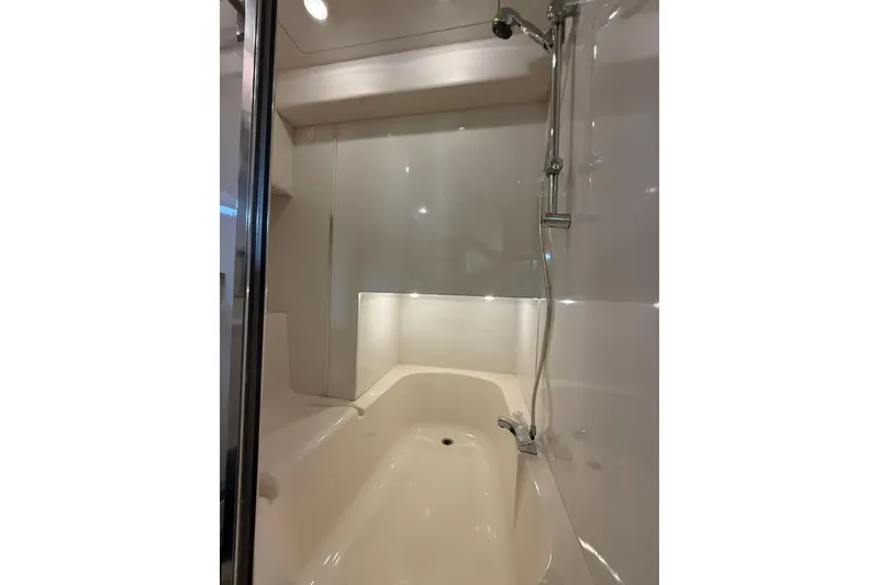 Slide: The Image of Luxurious bathroom in 1997 Bayliner 3988 Command Bridge Motoryacht with modern shower. - 30