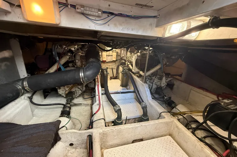 Slide: The Image of Engine room of a 1997 Bayliner 3988 Command Bridge Motoryacht, showcasing mechanical components. - 35