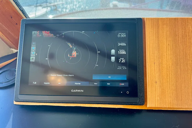 Slide: The Image of Garmin radar display on 1958 Blanchard Pilothouse, showing navigation and depth information. - 39