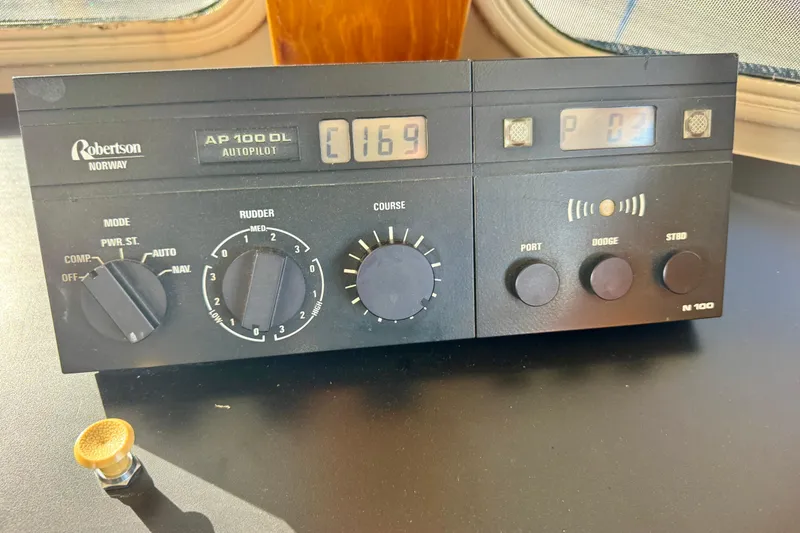 Slide: The Image of Autopilot control panel on a 1958 Blanchard Pilothouse boat, featuring Robertson AP 100 DL. - 41