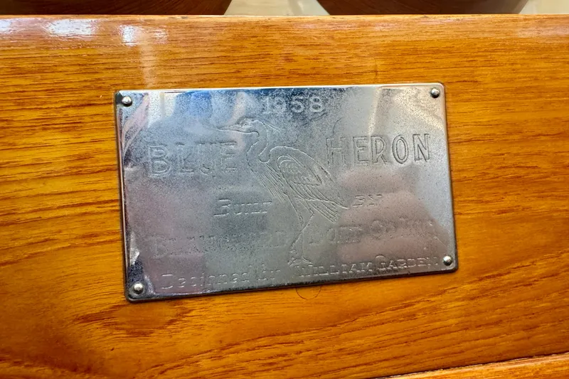 Slide: The Image of Plaque on 1958 Blanchard Pilothouse, engraved with "Blue Heron" and heron illustration. - 49