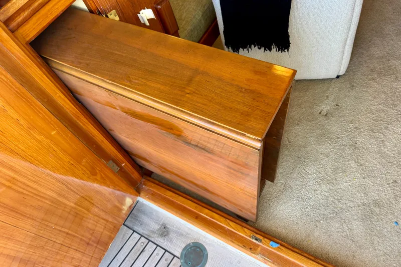Slide: The Image of Wooden interior detail of a 1958 Blanchard Pilothouse, showcasing craftsmanship and design. - 16