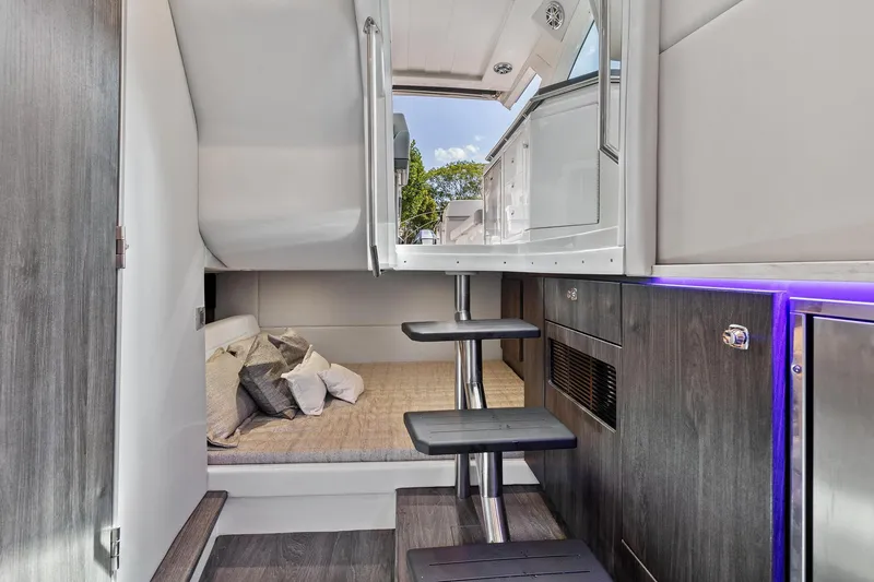 Slide: The Image of Interior of 2021 Formula 380 Super Sport Crossover OB with stairs and bed. - 18