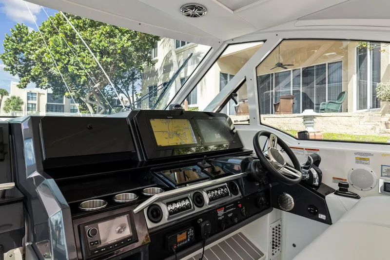 Slide: The Image of Interior view of 2021 Formula 380 Super Sport Crossover OB cockpit. - 6