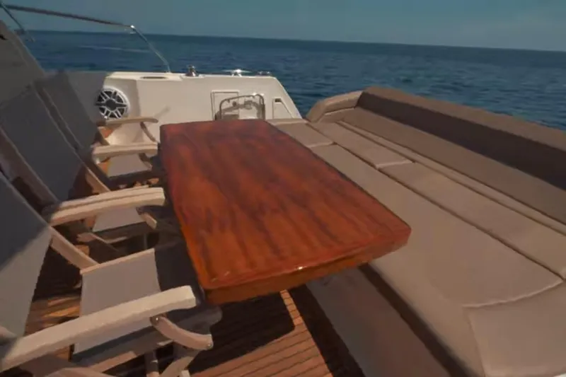 Slide: The Image of Luxury seating area on 2013 Prestige 550 S yacht with ocean view. - 14