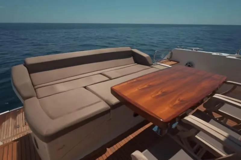 Slide: The Image of Luxurious seating area on 2013 Prestige 550 S yacht with ocean view. - 15