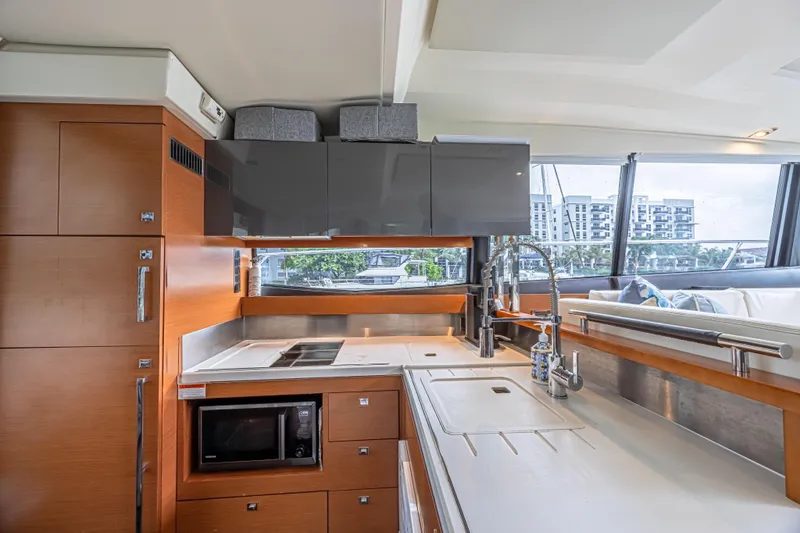 Slide: The Image of Luxurious kitchen interior of 2013 Prestige 550 S yacht with modern amenities. - 21