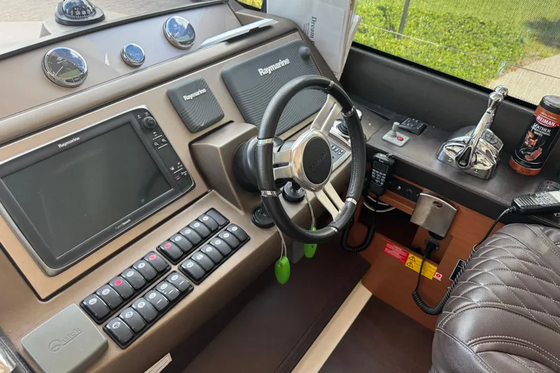 Slide: The Image of Control panel of a 2013 Prestige 550 S yacht with navigation equipment. - 29