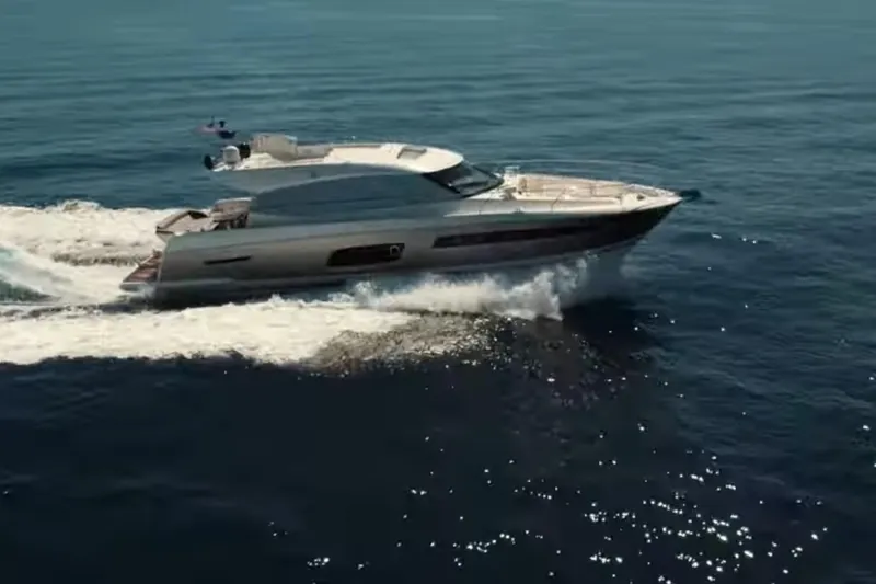 Slide: The Image of 2013 Prestige 550 S yacht cruising on open water, showcasing sleek design and performance. - 4