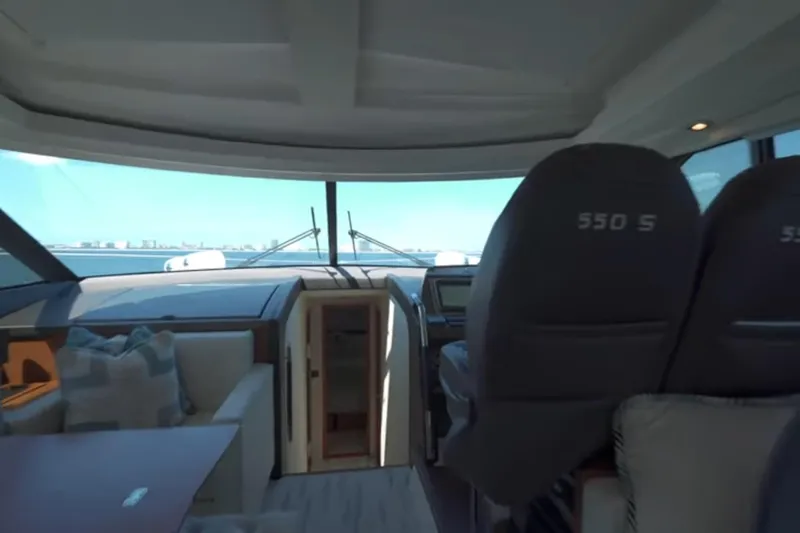 Slide: The Image of Interior view of 2013 Prestige 550 S yacht, featuring helm and seating area. - 40