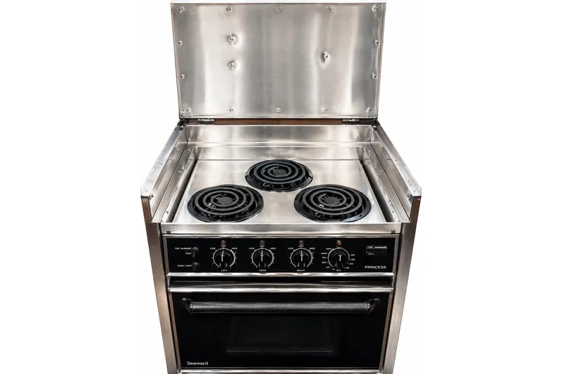 Slide: The Image of Stainless steel stove with three burners on a 1989 Grand Banks 42 Classic. - 26