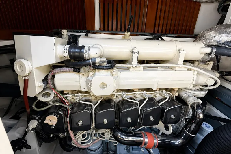 Slide: The Image of Engine of a 1989 Grand Banks 42 Classic yacht, showcasing intricate mechanical details. - 38