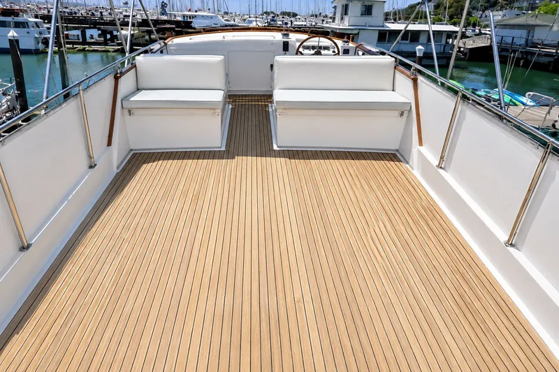 Slide: The Image of Flybridge of 1989 Grand Banks 42 Classic yacht with teak decking and seating. - 9