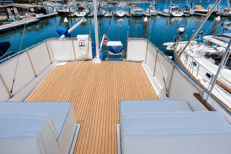 Slide: The Image of Spacious deck of 1989 Grand Banks 42 Classic yacht in marina setting. - 8