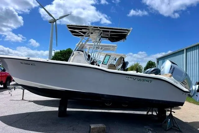 The Image of 2020 Key West 239 FS boat on display under a clear blue sky. - 0