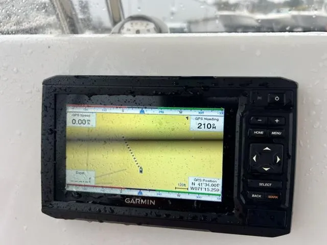 Slide: The Image of Garmin GPS display on a 2020 Key West 239 FS boat, showing navigation data. - 12